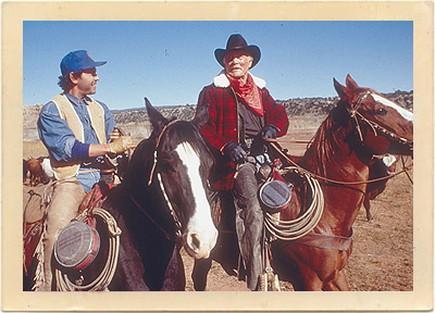 Billy Crystal and Jack Palance are on horseback in a scene from the highly successful 1991 movie, “City Slickers.”