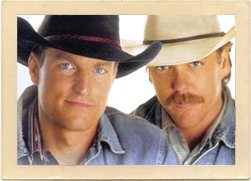 Woody Harrelson and Keifer Sutherland star in “The Cowboy Way.”